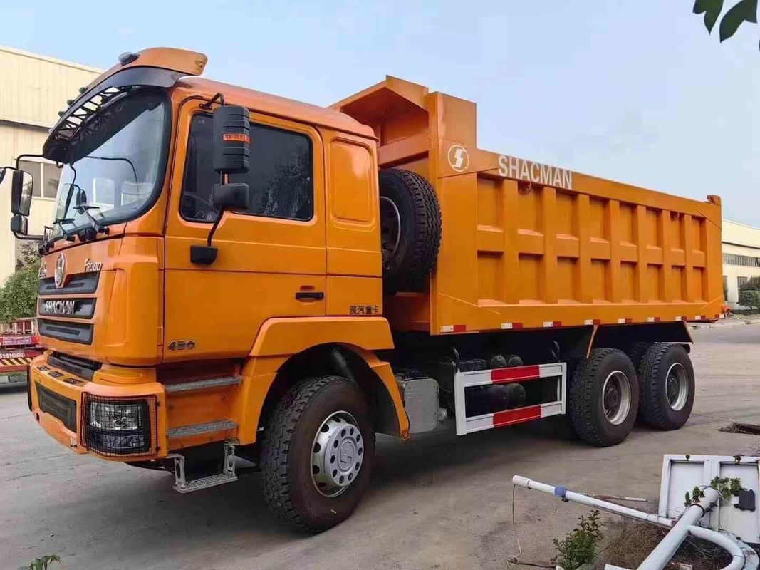 Neon Red Heavy Dump Truck 20 Cubic Yards Capacity MAN Axle Collision Mitigation System