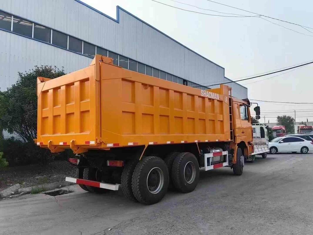 Neon Red Heavy Dump Truck 20 Cubic Yards Capacity MAN Axle Collision Mitigation System